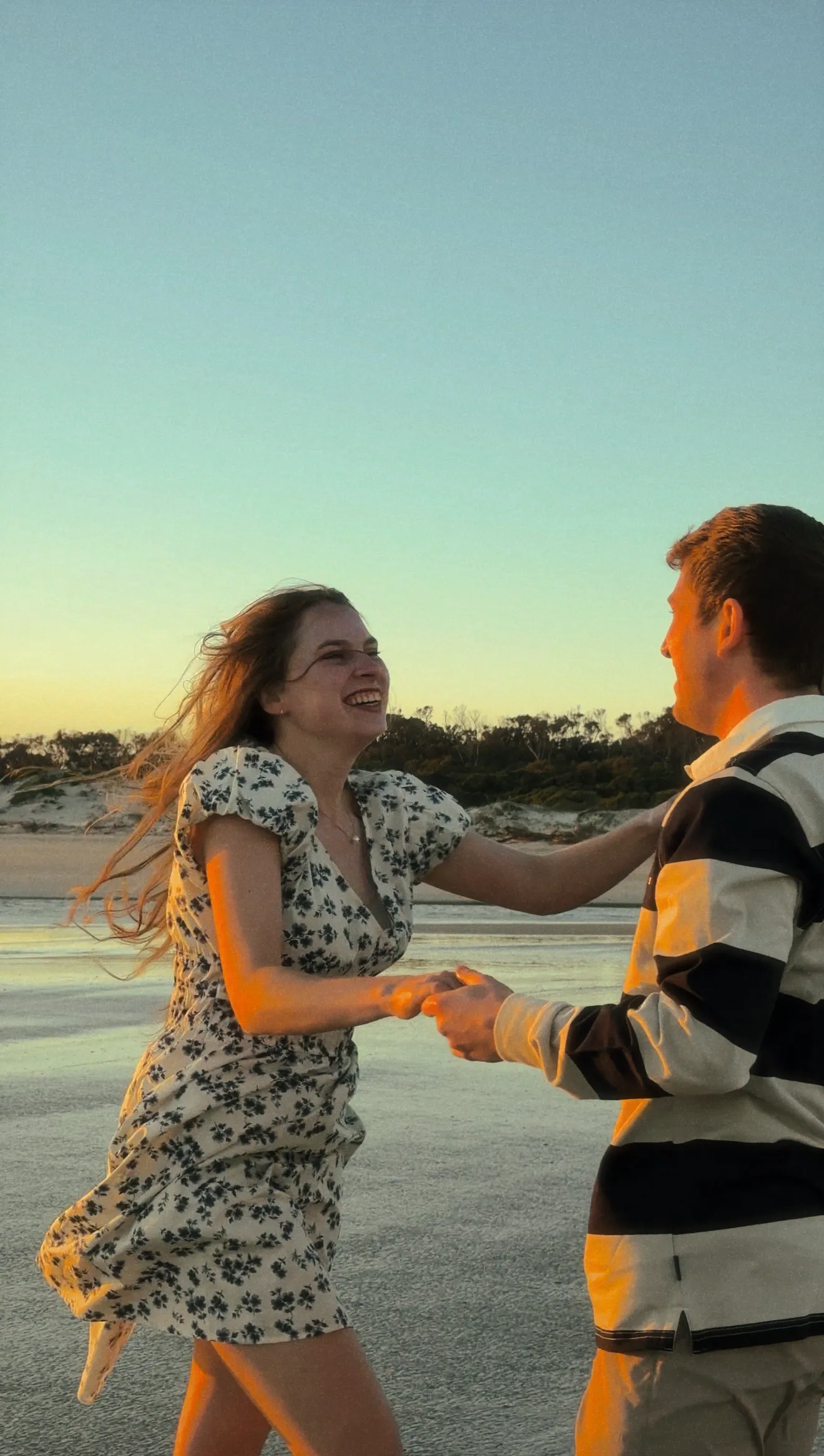 A couple dancing in the shallows