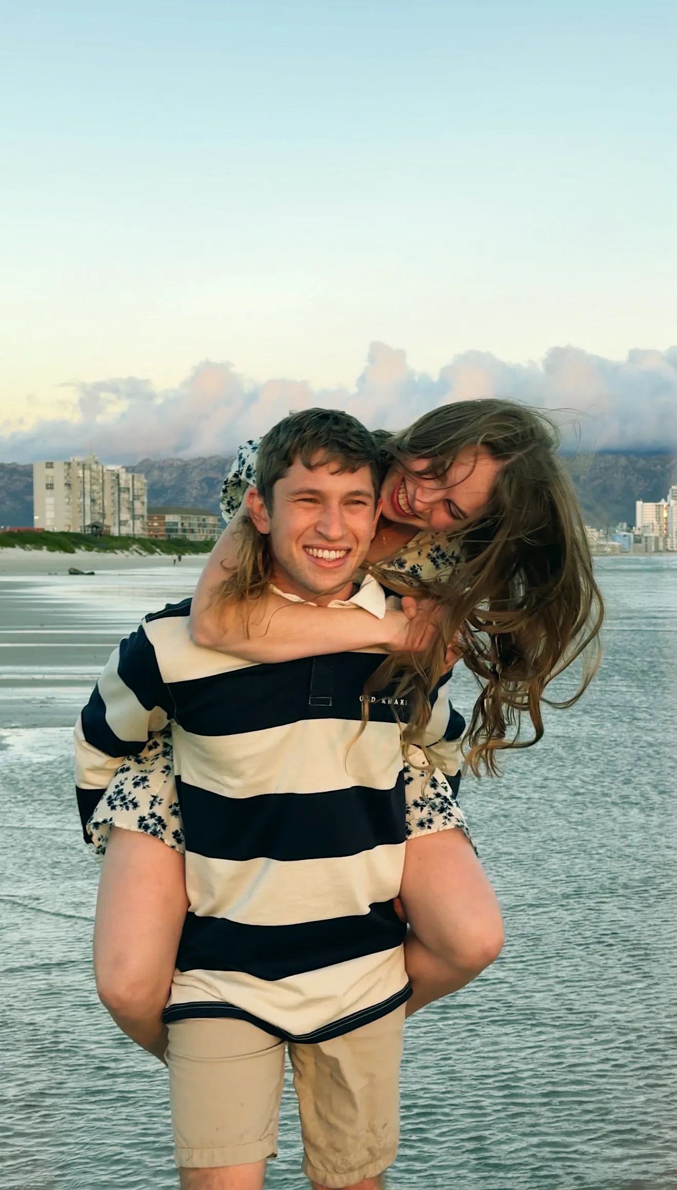 Carried piggyback along the shore